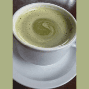 Cup of hot matcha tea.