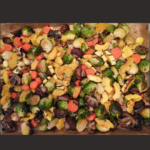 Baking sheet of roasted vegetables.