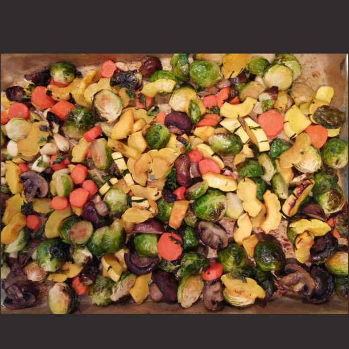 Baking sheet of roasted vegetables.