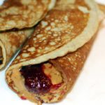 Two egg banana pancake peanut butter and jelly roll up.