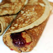 Two egg banana pancake peanut butter and jelly roll up.